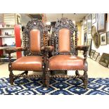 A PAIR OF VICTORIAN CARVED OAK THRONE CHAIRS WITH CARVED PHOENIX DECORATION