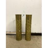 A PAIR OF TRENCH ART BRASS SHELLS WITH EMBOSSED DECORATION, 35CMS