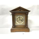 A LATE VICTORIAN WALNUT MANTLE CLOCK IN ARCHITECTURAL CASE WITH KEY, 36CMS