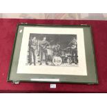 A PRINT COPY OF A PHOTOGRAPH OF THE BEATLES PERFORMING 50 X 36 CMS