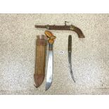 A MIDDLE EASTERN CURVED STEEL BLADE KNIFE, 42 CMS A KNIFE AND FORK IN A CARVED CASE AND A TRINIDAD