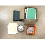 A LARGE QUANTITY OF WORLD STAMPS IN ALBUMS AND LOOSE STAMPS