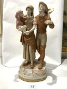 A ROYAL DUX BOHEMIA PORCELAIN GROUP OF FATHER & MOTHER HOLDING A CHILD, 48CMS