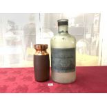 A LARGE ADVERTISING BOTTLE FOR CLEAR HAVANA CIGARS 50 CMS TALL ALSO A COPPER VASE 30 CMS