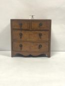 A MINIATURE BURR WALNUT BOW FRONTED CHEST OF FOUR DRAWERS, 19 X 20CMS