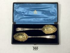 A PAIR OF GEORGE III HALLMARKED SILVER ENGRAVED TABLE SPOONS WITH GILT BOWLS, LONDON 1801 & 1810