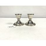 PAIR OF STERLING SILVER CIRCULAR SQUAT CANDLESTICKS