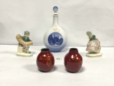 A COPENHAGEN PORCELAIN DECANTER, A PAIR OF SWANAGE VASES AND A PAIR OF FIGURE BOOKENDS