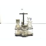 A HUKIN AND HEATH SILVER PLATED SIX BOTTLE CRUET, 14CMS