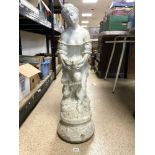 A STONE GARDEN FIGURE OF A GIRL HOLDING A DOVE 84 CMS