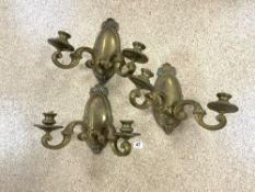 A SET OF THREE DUTCH STYLE ORNATE BRASS WALL SCONCES