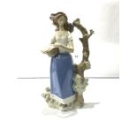 A REX-VALENCIA PORCELAIN FIGURE OF A LADY HOLDING A BASKET OF FLOWERS, 33CMS