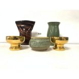 A GREEN TREE DECORATED STUDIO POTTERY VASE 18CMS WITH A BROWN AND BLACK STUDIO GLASS VASE 20 CMS AND