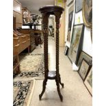 A REPRODUCTION MAHOGANY TWO TIER PLANT STAND, 102CMS