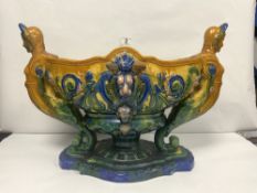 A MAJOLICA CENTRE PIECE WITH CLASSICAL FIGURE SUPPORTS,A/F 36CMS