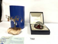 A CAITHNESS MOONFLOWER GLASS PAPERWEIGHT IN A BOX AND A CRYSTAL ART TREE WITH BOX