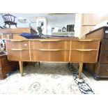 A MID CENTURY TEAK DRESSING TABLE WITH SIX DRAWERS, 140 X 66 X 46CM