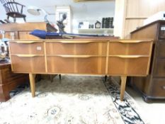 A MID CENTURY TEAK DRESSING TABLE WITH SIX DRAWERS, 140 X 66 X 46CM