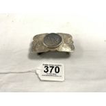 AN 1879 SILVER DOLLAR COIN MOUNTED AS A BUCKLE MARKED STERLING BOYD - RENO NEV, 83 GRAMS