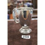 A HALLMARKED SILVER CIRCULAR TAPERED CHRISTENING MUG 11.5CMS BIRMINGHAM 1941, MAKERS BERT GORDON,