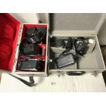 A NIKON M90 AUTO CAMERA OLYMPUS CAMERA IN CASES WITH ACCESSORIES