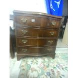 A REPRODUCTION FLAME MAHOGANY SERPENTINE FRONT CHEST OF FOUR DRAWERS, 70 X 46 X 80CMS