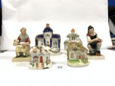 A PAIR OF STAFFORDSHIRE FIGURES COBBLER AND WIFE, TWO STAFFORDSHIRE COTTAGE PASTILLE BURNERS, AND