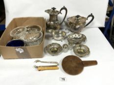 A PLATED THREE-PIECE TEA SET, SIX KNIVE RESTS OTHER PLATED WARES, AND GLASS