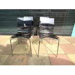 A SET OF FOUR DOMITALIA PERSPEX DINING CHAIRS ON CHROME LEGS
