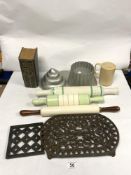 THREE VINTAGE CERAMIC ROLLING PINS, TWO IRON TRIVETS, JELLY MOULDS MRS BEETON BOOK ETC