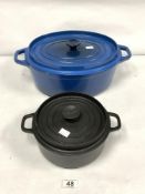 AN INVICTA CAST IRON CASSEROLE DISH AND A SMALLER INVICTA LIDDED COOKING POT