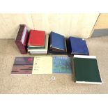 A QUANTITY OF STAMP ALBUMS WITH WORLD STAMPS AND FIRST DAY COVER ALBUMS