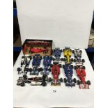 A FORMULA ONE MICHAEL SCHUMACHER COLLECTION RACING CAR IN BOX AND TEN UNBOXED FORMULA ONE RACING