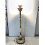 A MODERN BRASS LAMP STAND ON A CIRCULAR BASE, 100CMS