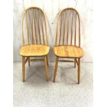 A PAIR OF STICK BACK DINING CHAIRS