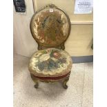 A 19TH CENTURY GILTWOOD AND TAPESTRY UPHOLSTERED BOUDOIR CHAIR