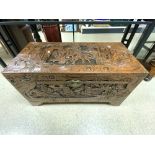 A HEAVILY CARVED CHINESE CAMPHOR WOOD BLANKET CHEST, 94 X 46 X 50CMS