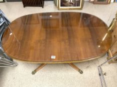 A REGENCY STYLE YEWOOD OVAL COFFEE TABLE ON SPLAY LEGS,74 X 120CMS
