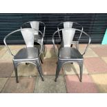 A SET OF FOUR METAL TOLIX CHAIRS