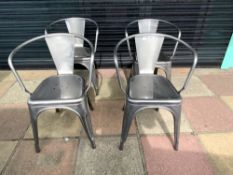 A SET OF FOUR METAL TOLIX CHAIRS