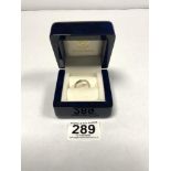 AN UNMARKED 18CT WHITE GOLD AND SOLITAIRE DIAMOND RING, 2.7 GRAMS SIZE M