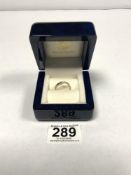 AN UNMARKED 18CT WHITE GOLD AND SOLITAIRE DIAMOND RING, 2.7 GRAMS SIZE M