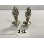 TWO WHITE METAL BOTTLE STOPPERS