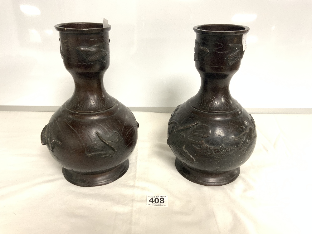 A PAIR OF LATE 19TH CENTURY, EARLY 20TH CENTURY JAPANESE BRONZE VASES WITH RAISED DECORATION