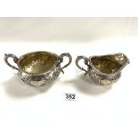 GEORGE III HALLMARKED SILVER HEAVILY EMBOSSED CIRCULAR SUGAR BOWL AND MATCHING CREAM JUG, LONDON