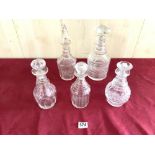 FIVE CUT GLASS DECANTERS, ONE WITH GILT DECORATION