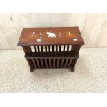 A BRASS INLAID INDIAN HARDWOOD MAGAZINE RACK WITH INLAID FIGURE DECORATION