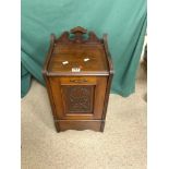 A LATE VICTORIAN CARVED RED WALNUT COAL PARDONIUM