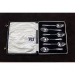 A SET OF SIX HALLMARKED SILVER ENGRAVED TEASPOONS IN CASE - SHEFFIELD 1902 - MAKERS ATKIN