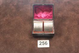 A PAIR OF HALLMARKED SILVER ENGINE TURNED NAPKIN RINGS IN CASE, CHESTER 1927, MAKERS-E J TREVITT &